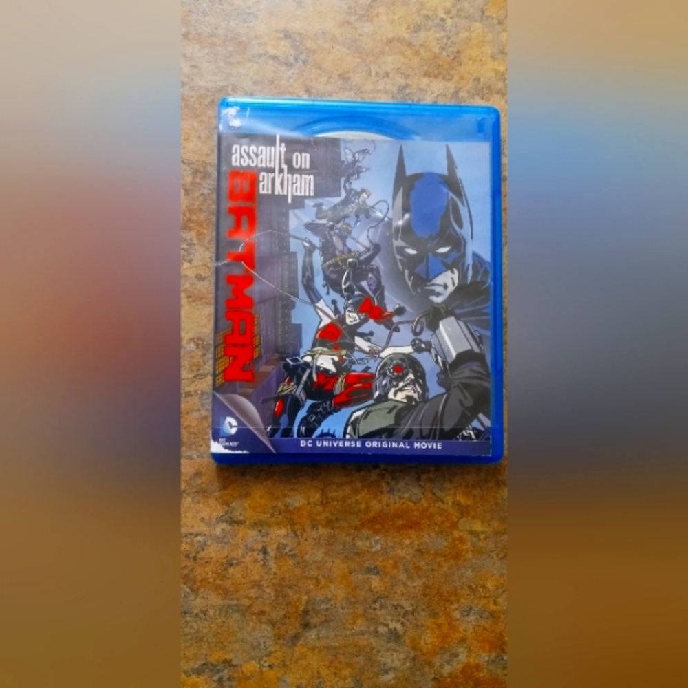 Batman: Assault on Arkham Blu-ray Disc (Blue) and dvd disc